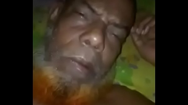 Bangladeshi uncle having fun with a young boy